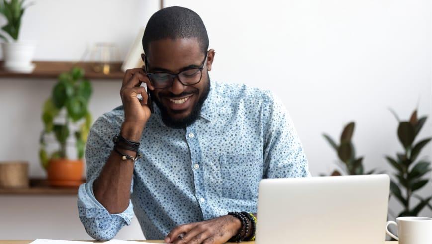 Image of a man working at a desk