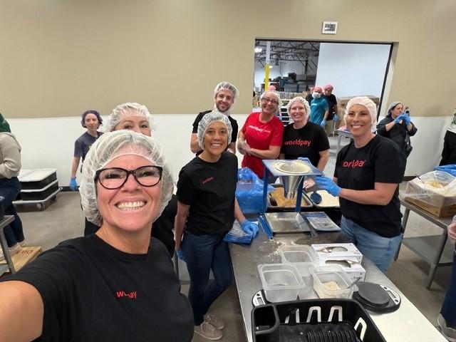 group of people packaging items