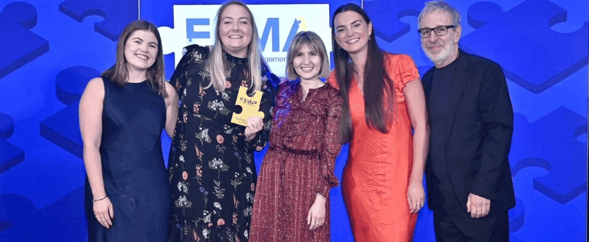 group of people winning an award