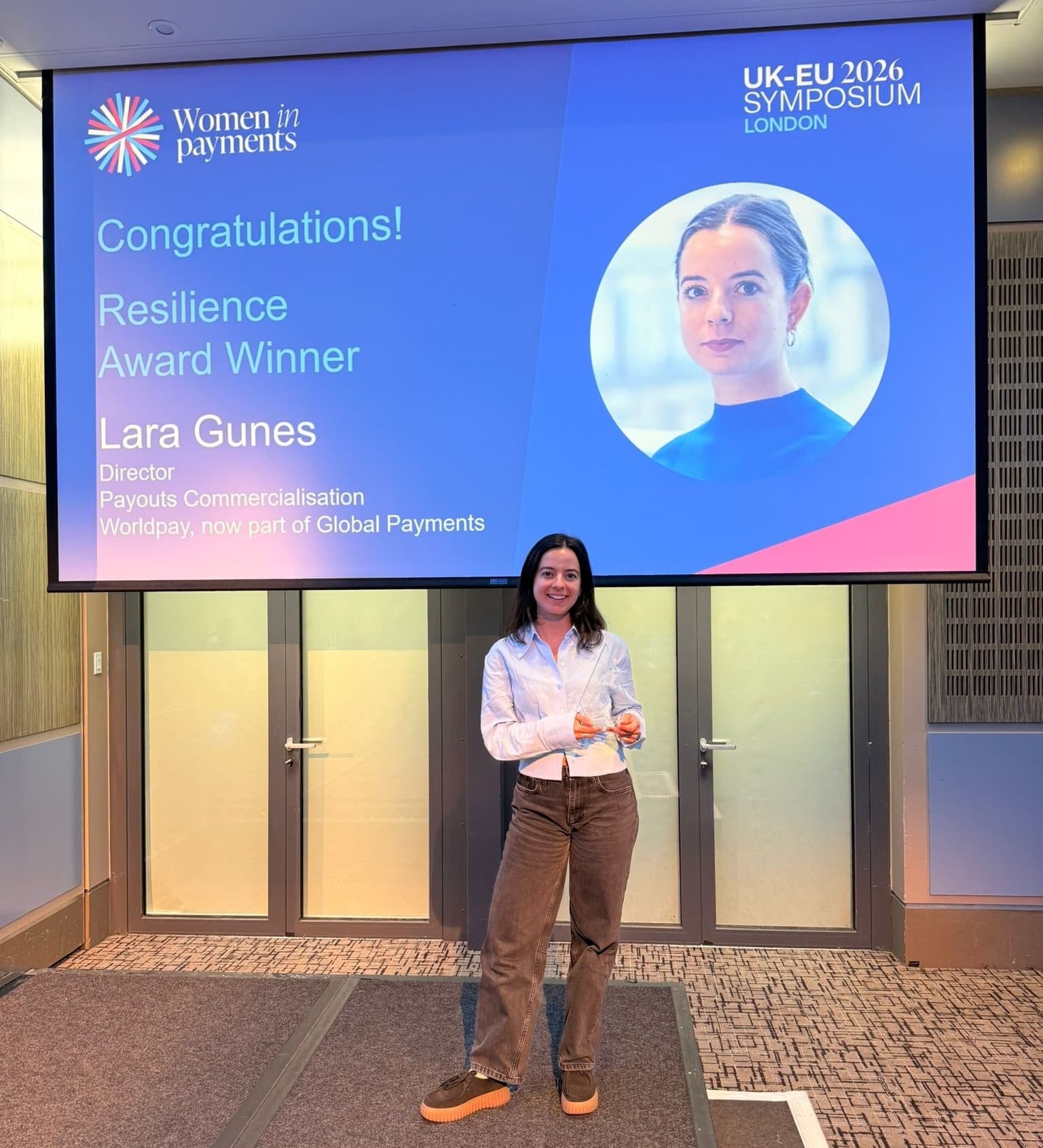 woman winning award