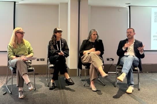 group speaking at symposium